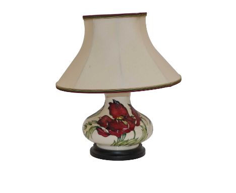 A modern Moorcroft lamp, decorated in the Dancing Flame pattern