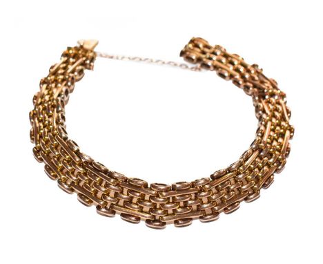 A gate link bracelet, stamped '9CT', length 19.5cmCondition report: The bracelet is in good condition with slight wear commen