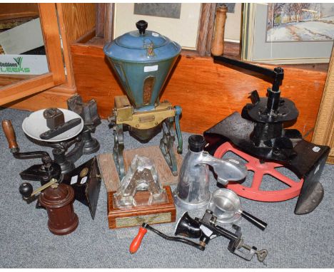 A Victorian cast iron wall mounting coffee grinder by makers Kenrick &amp; sons, together with another large wall mounting co