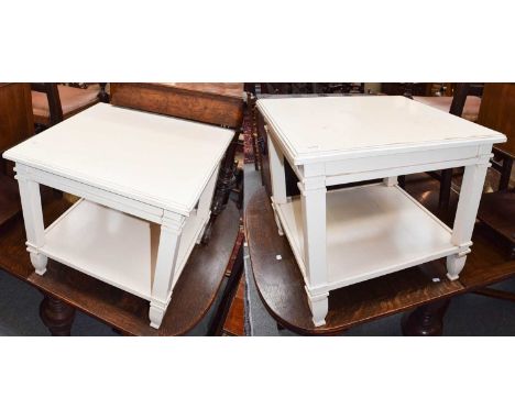 A pair of modern painted hardwood lamp tables raised on square supports and with under tier, 60cm square by 55cm