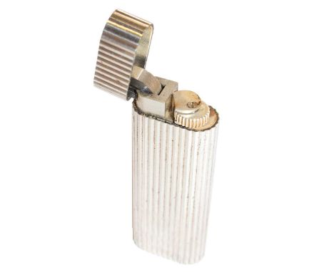 A Cartier silver plated lighter, decorated with reeded mouldings (unboxed)