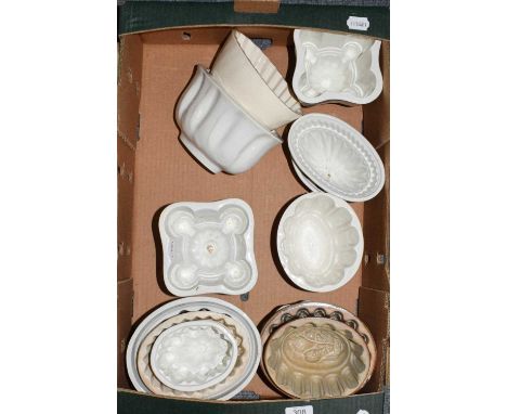 A group of Victorian pottery jelly moulds some stamped Spode and Copeland