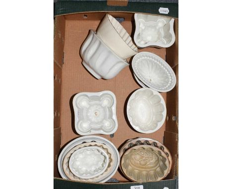 A group of Victorian pottery jelly moulds some stamped Spode and Copeland