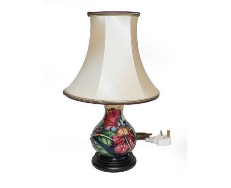 A modern Moorcroft lamp decorated in the Simeon pattern