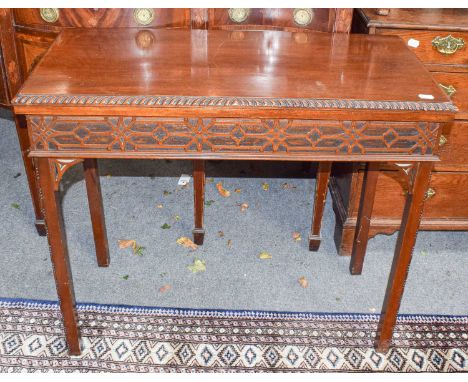 A Chippendale style mahogany fold over table