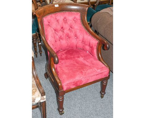 A William IV mahogany upholstered armchair, with button back and studded decorationCondition report: With a cracked arm, fail