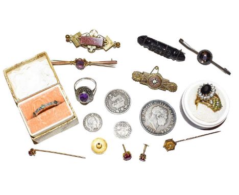 A collection of jewellery including two 9 carat gold rings, two further rings, a bar brooch stamped '9CT', four further bar b