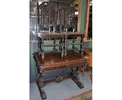 A Victorian carved oak library or centre table, circa 1870, of canted rectangular form, the carved frieze drawer with carved 