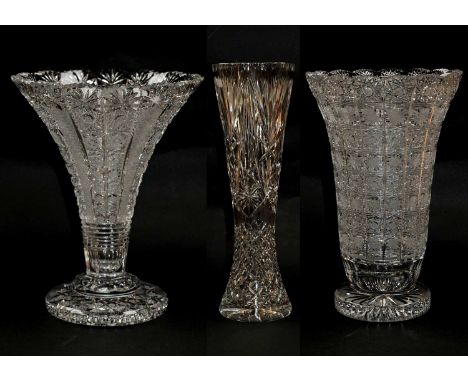 Three large cut crystal vases, two of trumpet form and raised on circular plinths, tallest 46.5cm H (3)