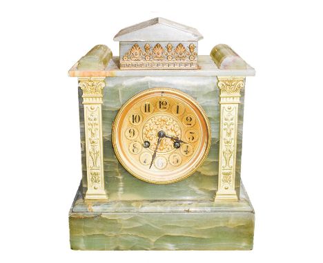 A 19th century green onyx eight day striking mantel clock, adorned with gilt metal mounts, French movement striking on coiled