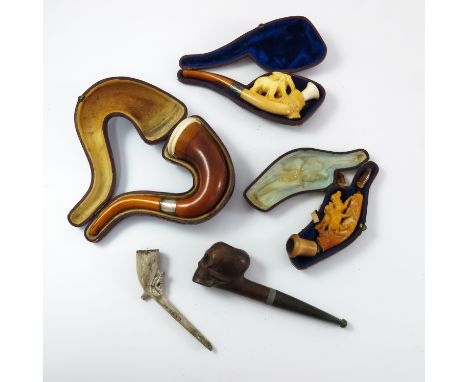 MISC OLD PIPES INC MEERSCHAUM CARVED ELEPHANT ONE WITH CARVED HUNTING DOGS AND ONE OTHER BRIAR SKULL PIPE AND A CLAY PIPE