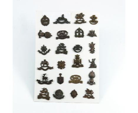 MILITARIA, A COLLECTION OF 24 BRITISH ARMY OFFICER'S COLLAR BADGES, TANK CORPS, BLACK WATCH, NORFOLK ETC.