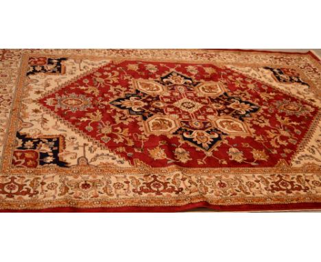 A red ground Heriz carpet, 280 x 200cm.