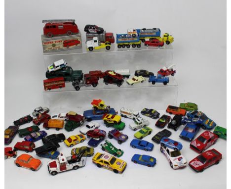 A large quantity of diecast vehicles to include a boxed Dinky Fire Engine no955, three other boxed vehicles, a large quantity