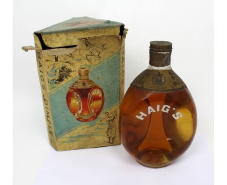 A boxed bottle of Haig's 'Dimple Scot's Scotch Whisky'.