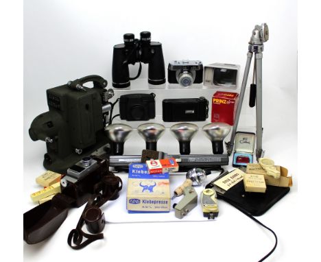 A cased Paillard Bolex M8 cine projector, a Bell and Howell autoset 624EE cine camera, a boxed Ising Klebepresse splicer, a b