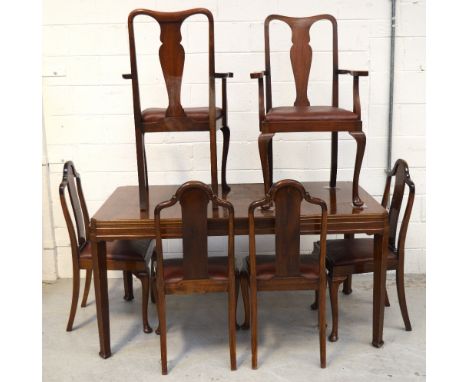 A mid-20th century mahogany dining table, length 152cm, four Chippendale-style dining chairs and two matching carvers (7).