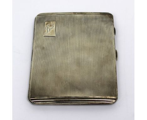 A George VI hallmarked silver engine-turned cigarette case, Birmingham 1941, approx 4.7ozt.