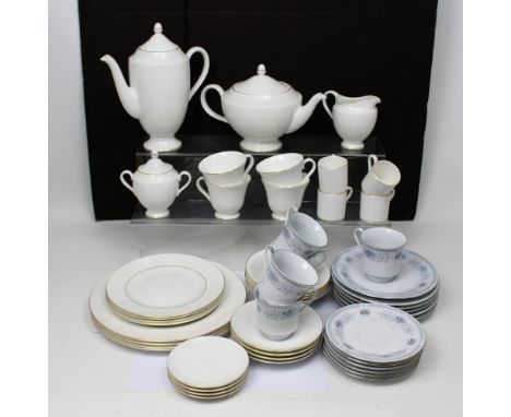 A Wedgwood part dinner/tea service 'Signet Gold', to include teapot, coffee pot, cups, saucers, plates etc and a floral-decor