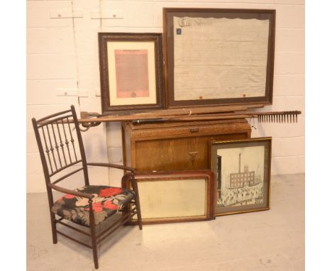 A quantity of gardening tools to include a rake, a hoe, a two-prong hay fork etc and an oak blanket box on square sectioned s