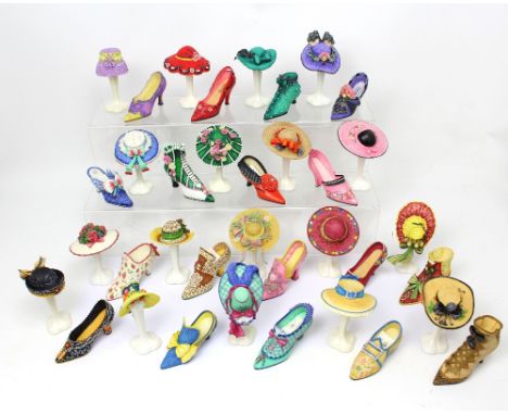 A collection of thirty-six Willow Hall model shoes and hats, all documenting various fashion eras (36).