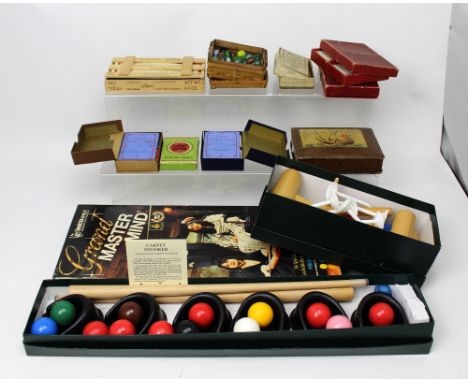 A quantity of children's games to include Townsend Ltd 'Carpet Croquet' and Townsend 'Carpet Snooker', a small basket of marb