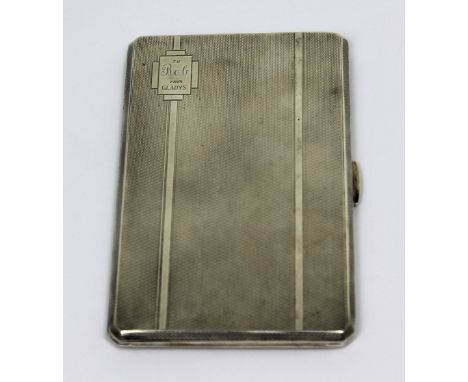 A George VI hallmarked silver engine-turned cigarette case, Birmingham 1941, approx 6.7ozt.