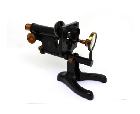 Beck, London; a Model 22 adjusting microscope, height 29cm, in oak case.