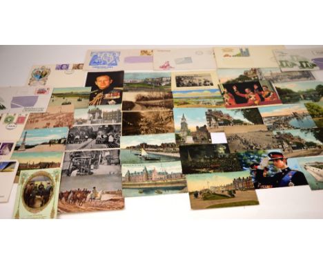 A collection of first day covers and postcards including examples for Southport.
