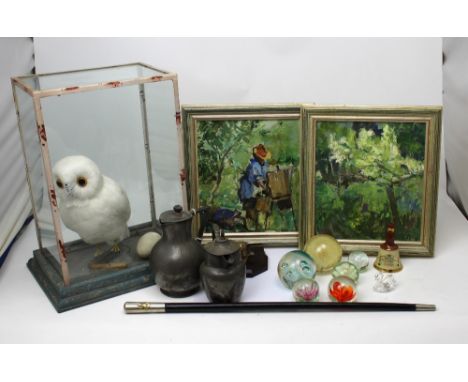 A large doll in period costume with ceramic head, two Australian ornamental masks, figure of an owl in glass case, ostrich eg