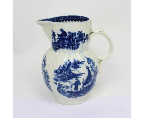 Attributed to Caughley, Worcester; a late 18th/early 19th century blue and white mask head jug decorated in the Chinoiserie s