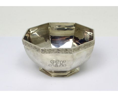 A George V hallmarked silver octagonal dish, the rim with bright-cut decoration, inscribed 'AEK', on octagonal foot, Roberts 