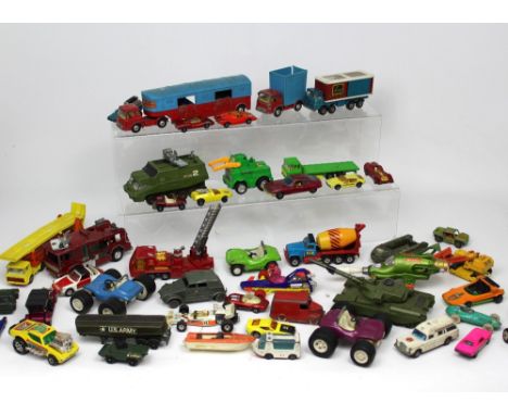 A quantity of vintage toy cars to include Corgi and diecast models, also a quantity of vintage marbles.