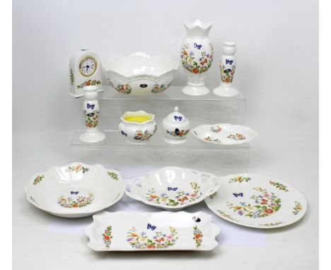 A collection of Aynsley 'Cottage Garden' pattern ceramics to include vases, Windsor bowls, clocks, candlesticks etc.