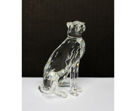 A boxed Swarovski crystal model of a cheetah, height 10.2cm.