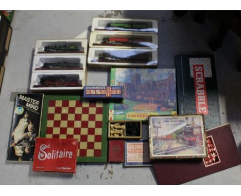 A boxed 'Mastermind' game, a boxed set of dominoes, a boxed 'Famous Cathedrals' jigsaw puzzle, a boxed 'Scrabble Set', fruitw