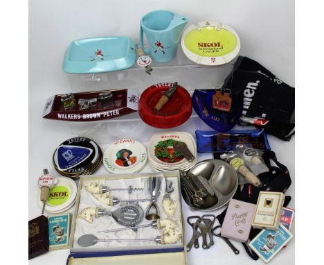A quantity of pub ashtrays, beer mats, playing cards etc.