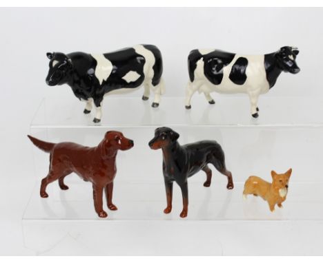 Beswick; two glazed ceramic cows, a Rottweiler, Setter and Corgi (5).