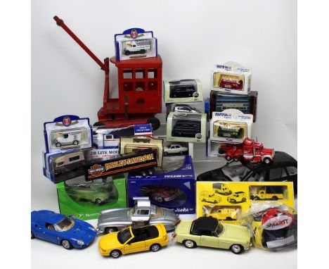 A large collection of diecast model vehicles, to include examples from Exclusive First Editions, Oxford Diecast, Lledo, Maist