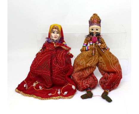 Two contemporary Indian puppets, a vintage small teddy bear, a plastic Walt Disney Productions Mickey Mouse, an Anne Wilkinso