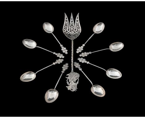 A set of eight Eastern silver-coloured metal teaspoons, apparently unmarked, together with a serving fork, with pierced bowl 