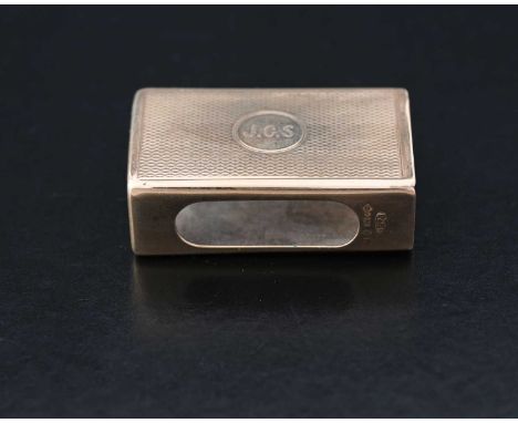 A George V nine-carat gold matchbook holder, of rectangular form, the exterior decorated with engine-turning, the central cir