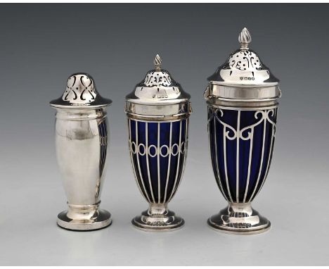 A George V silver caster, with blue glass liner, the wirework body, atop a circular foot, the cover with bayonet fitting, Has