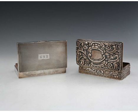 An Elizabeth II silver cigarette box, of rectangular form, the hinged cover decorated with engine-turning, initialled 'R.G.S'