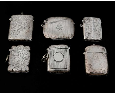 Six twentieth-century English hallmarked silver vesta cases, to include an oval example decorated with engine turning, length