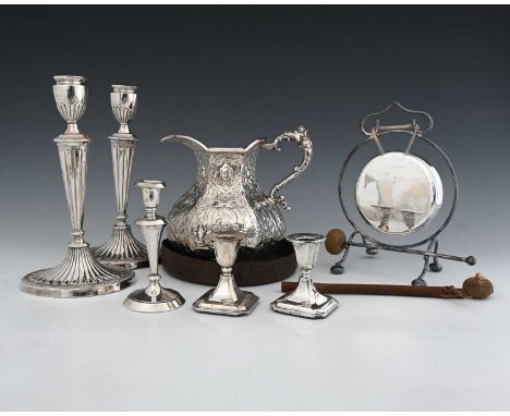 An Edward VII silver candlestick, Birmingham 1901, with filled base, height 15.5cm, together with a pair of silver dwarf cand