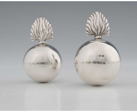 Two early twentieth-century silver novelty grenade form table lighters, applied with a cast flame-form surmount, secured by a