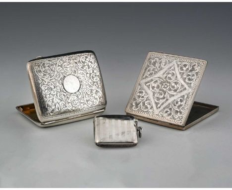 A George VI silver cigarette case, of rounded rectangular form, the exterior decorated with foliate scrolls, with gilt interi