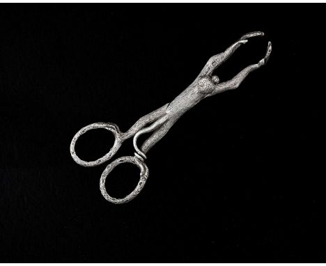 A single pair of Victorian cast silver novelty zoomorphic sugar tongs, modelled in the form of a monkey, with arms outstretch