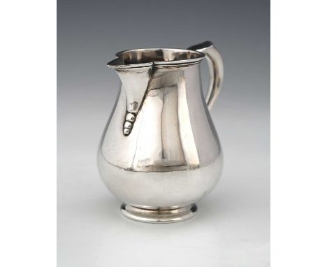 A George V silver sparrow beak cream pitcher or jug, after the early eighteenth-century style, retailed by Ross of Norwich, s